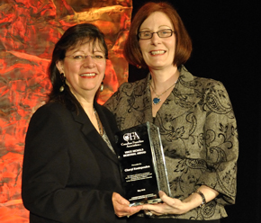 Cheryl receiving the Vince Nichols Memorial Award